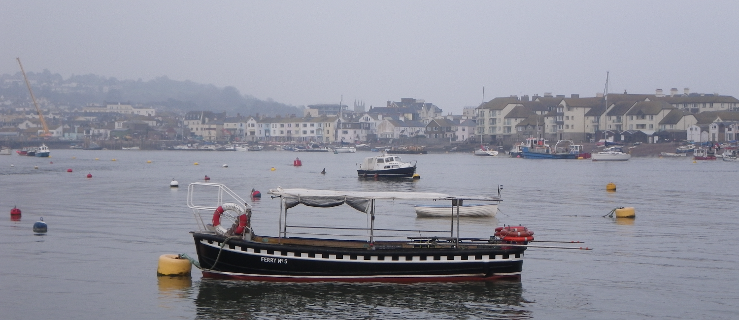 Teignmouth to Shaldon ferry with harbour in the distance
